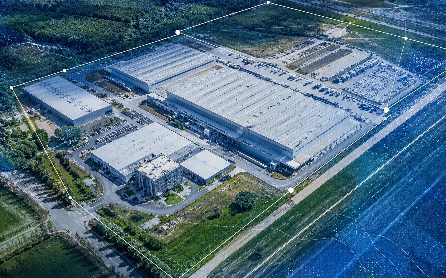 Vue aérienne cartographique d’un site industriel avec emprise de relevé